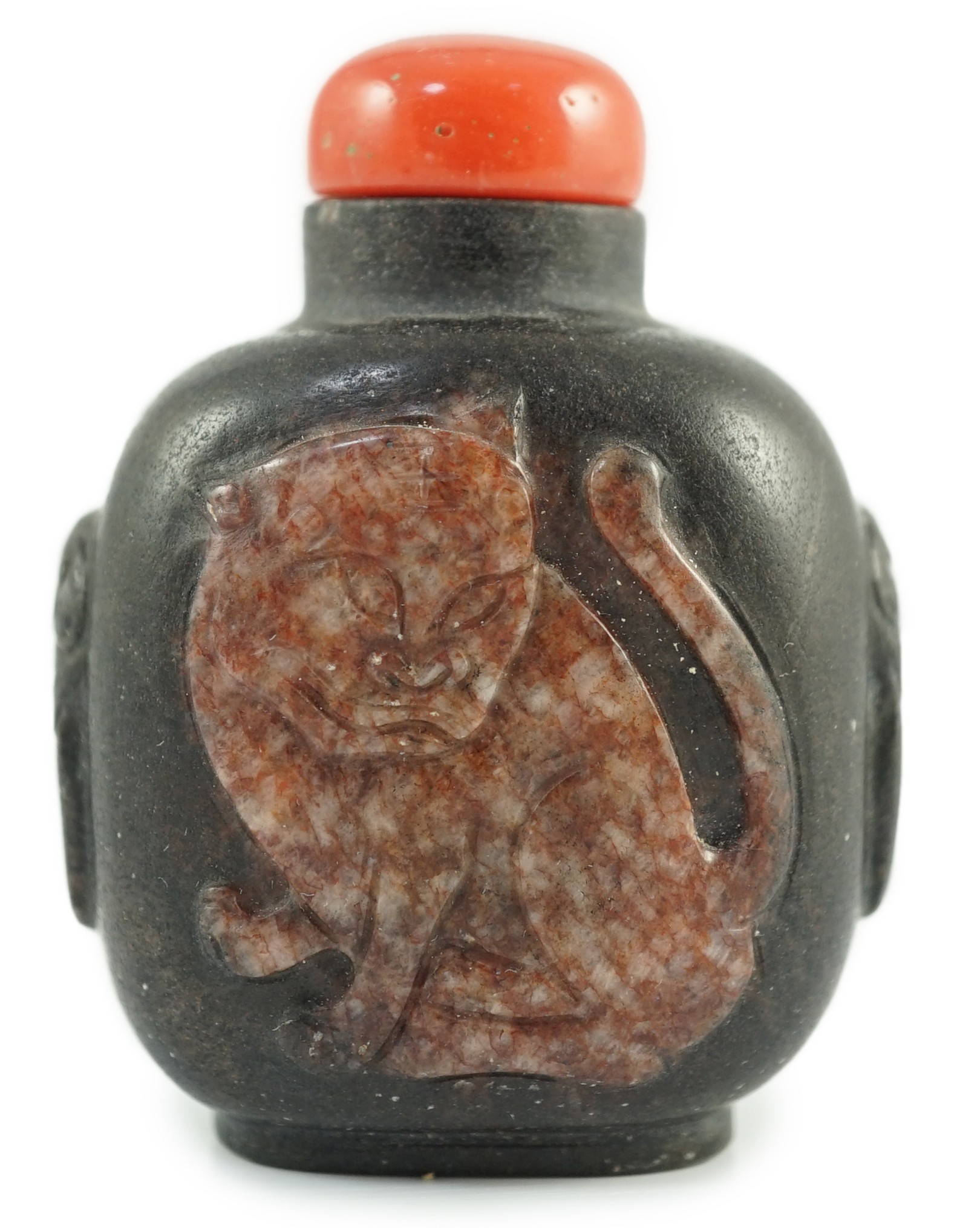 A Chinese two colour marble cameo ‘tiger’ snuff bottle, 19th century, 5.4cm high